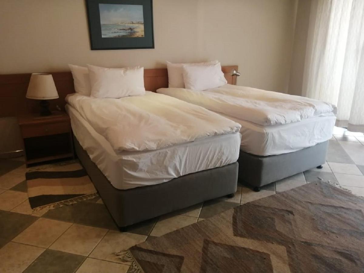 Hotel Pension Palmquell Klein Windhoek Экстерьер фото